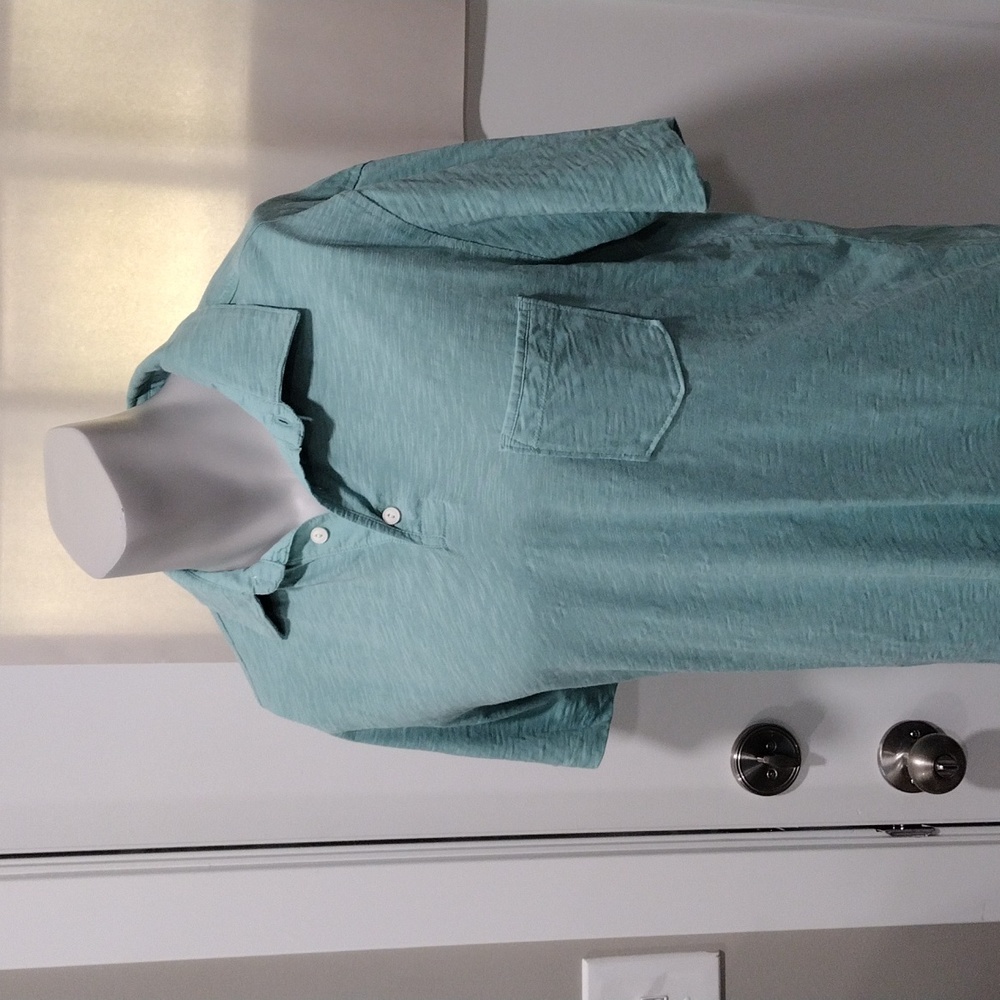 1901 soft green cotton polo with pocket. Medium